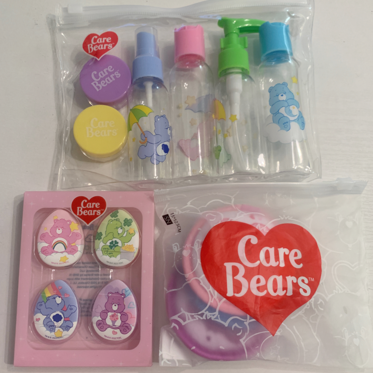 Care Bears Cartoon 14pc Lot Travel Bottles, Mini Makeup Puffs, Powder Puffs New